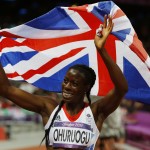 Britain's Christine Ohuruogu celebrates after she won silver in the women's 400m final during the London 2012 Olympic Games at the Olympic Stadium